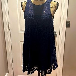 Free People Navy lace swing mini dress with mesh racer back. Size XS